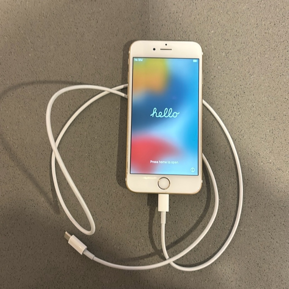 iPhone with charging cable